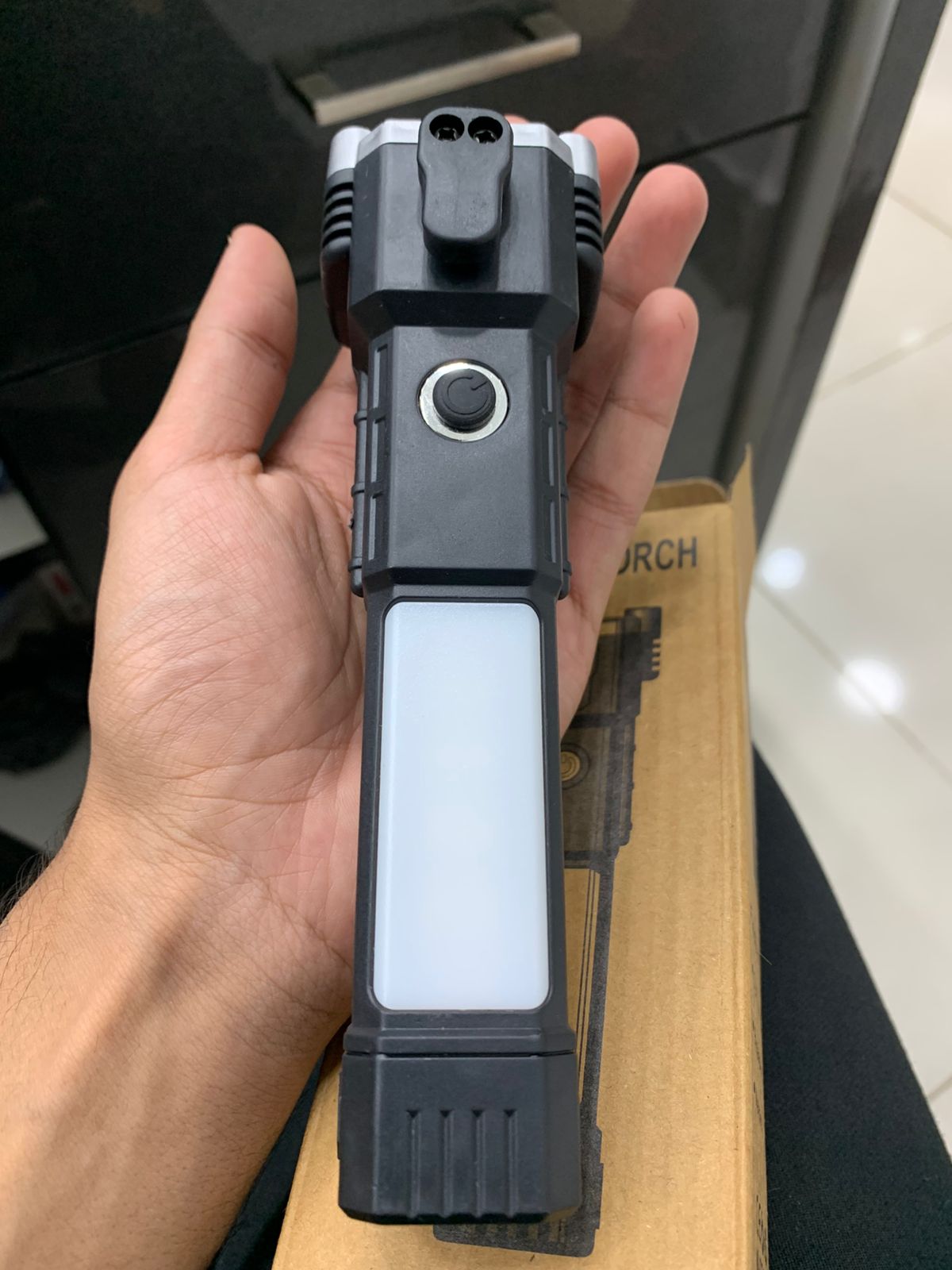 8-in-1 Rechargeable LED Torch Light with Safety Hammer & Phone Charger (Random Color, Box Included)